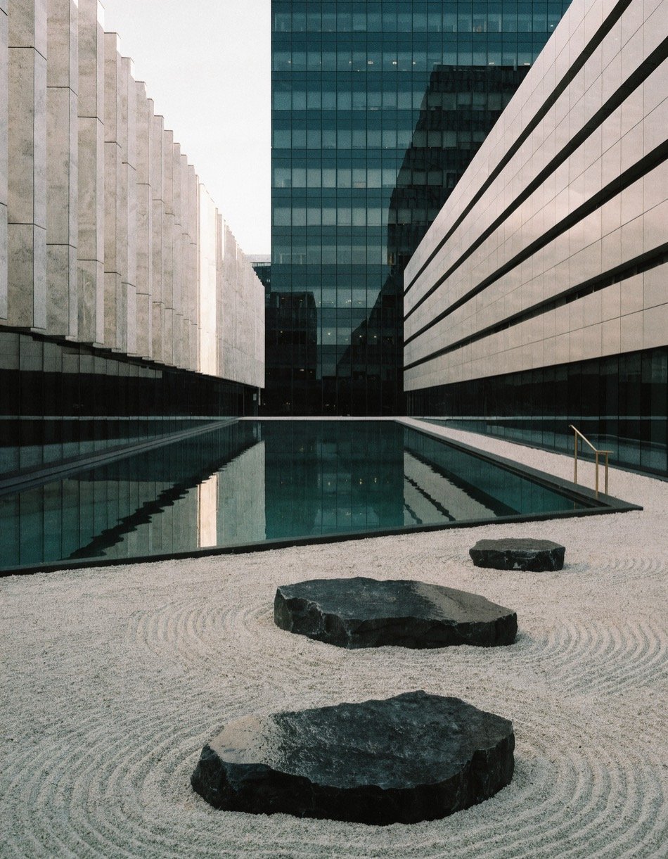 Stone courtyard garden between city buildings